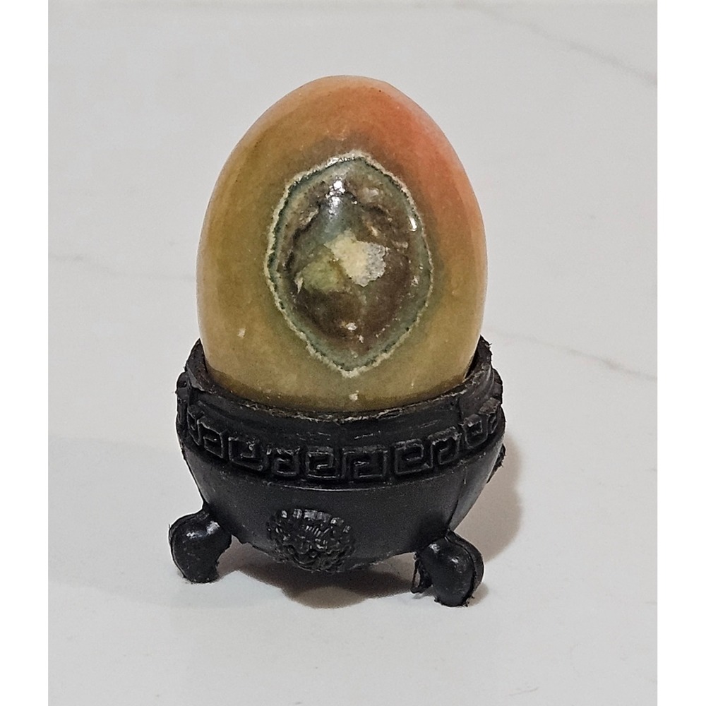 Polished Banded Onyx Stone Egg with Ornate Black Display Stand